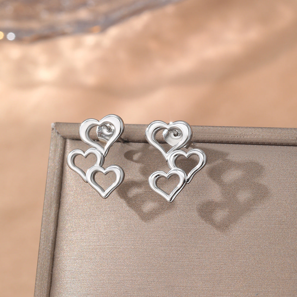 Wholesale New Valentine's Day Simple Fashion Love Stitching Hollow Earrings